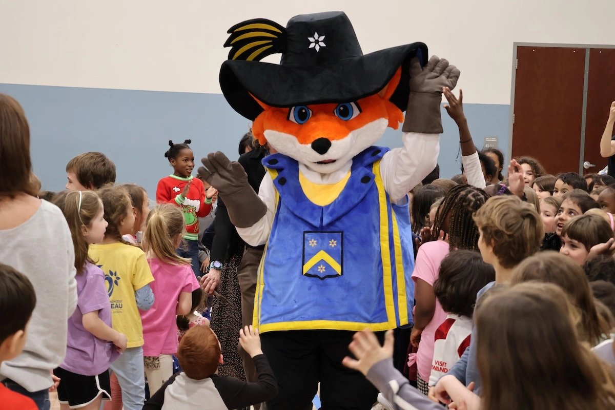 Rochembeau school community meeting the mascot