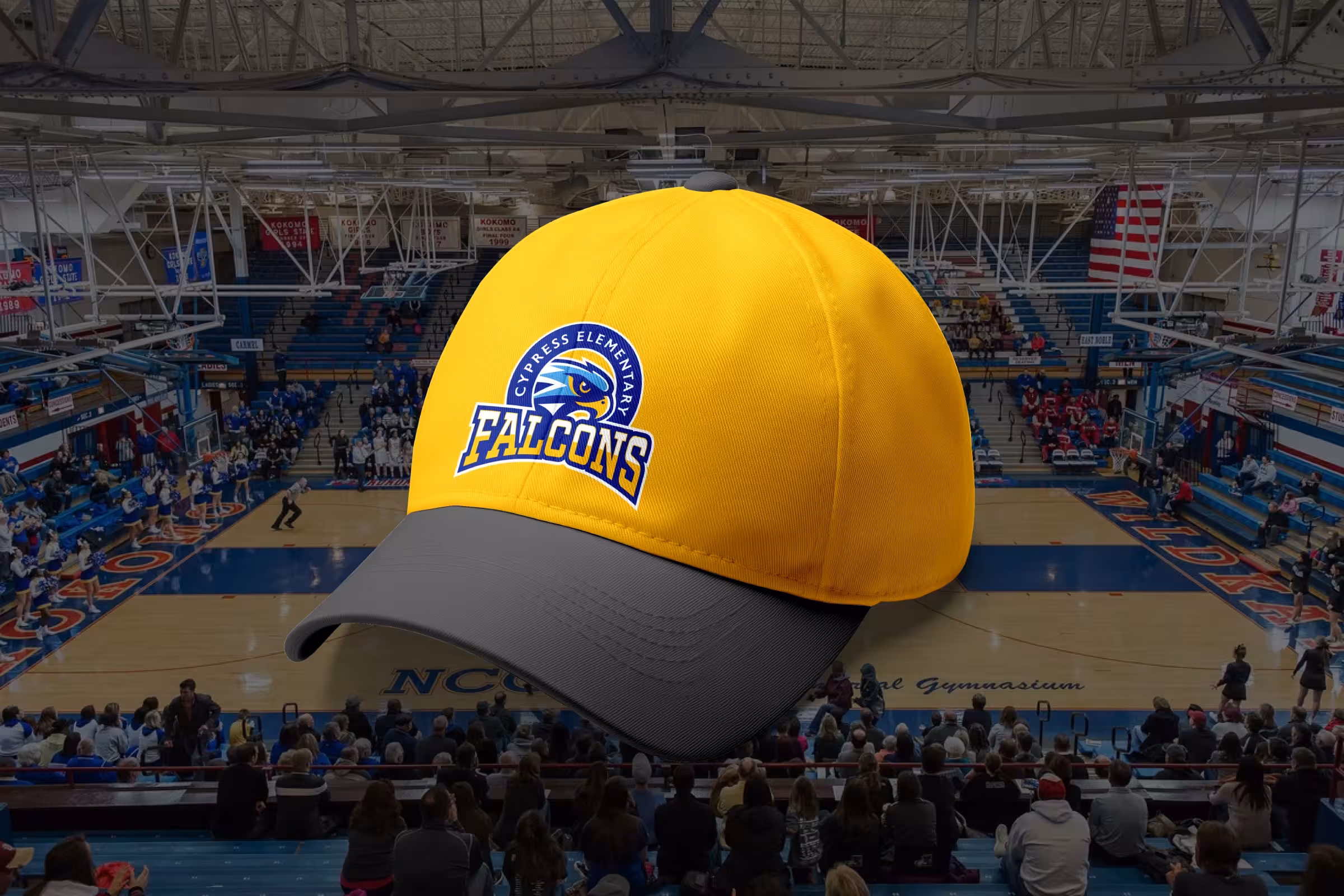 Royal/gold cap with embroidered Falcons crest—gymnasium setting for game‑day spirit wear