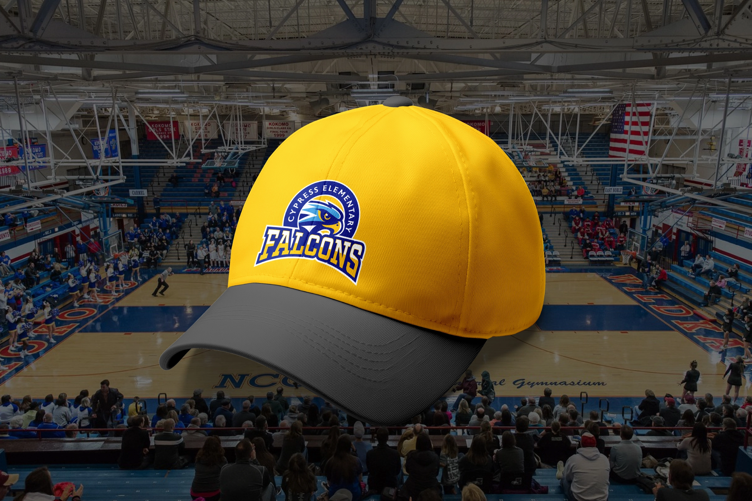 Royal/gold cap with embroidered Falcons crest—gymnasium setting for game‑day spirit wear