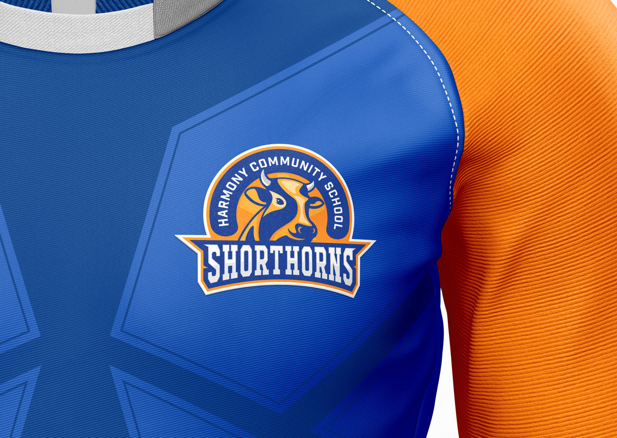 Brand applications—crest on apparel, caps and field graphics