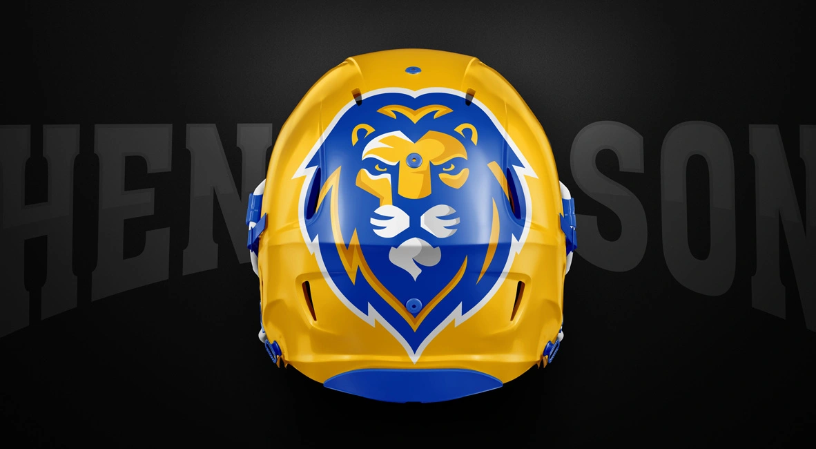 Custom football helmet mockup in premium gold finish featuring the simplified lion shield mark in royal blue—demonstrating how the athletic identity system adapts to three-dimensional protective equipment while maintaining brand recognition