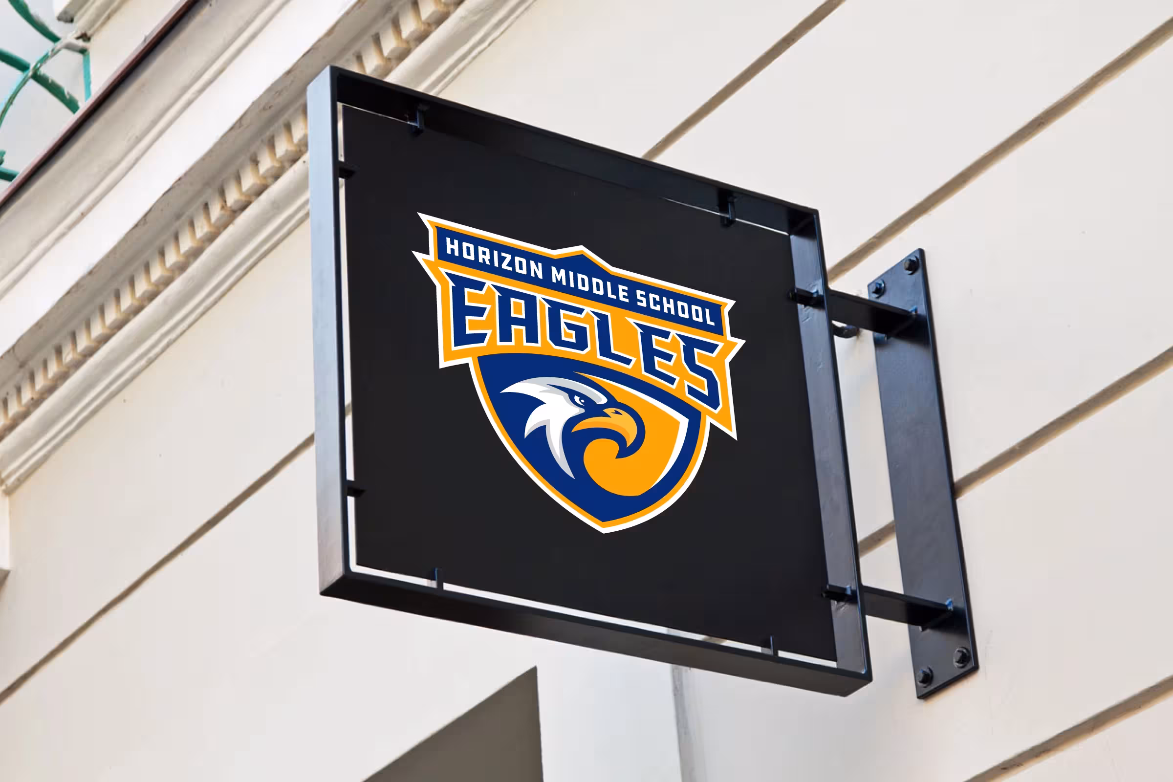 Interior blade sign—compact crest for corridors