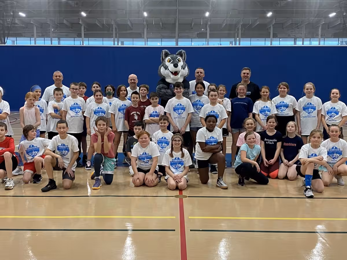 Stationery/official mark layouts for college communications—crest and wordmark hierarchy